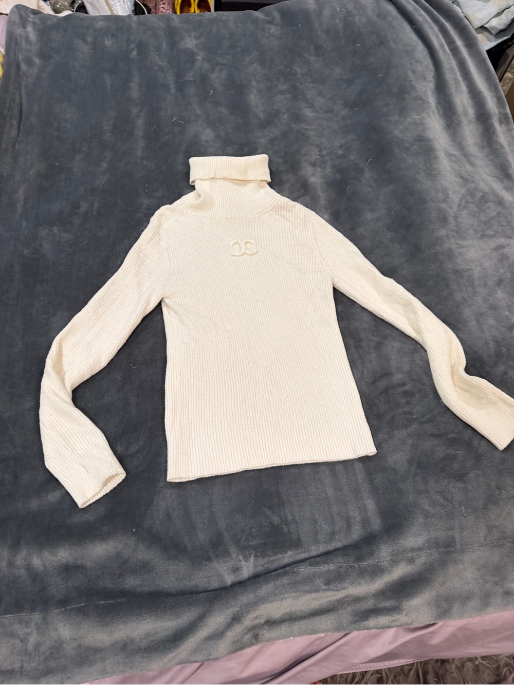 CHANEL Cream Ribbed Turtleneck with Subtle CC Motif